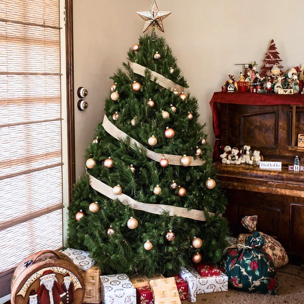 Real fresh pine Christmas tree decorated with copper ornaments